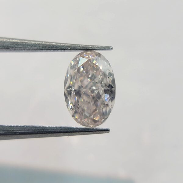 (M356) Natural Fancy Light Orangy Pink Color 0.26CT SI1 Clarity Oval Shape GIA Certified Diamond