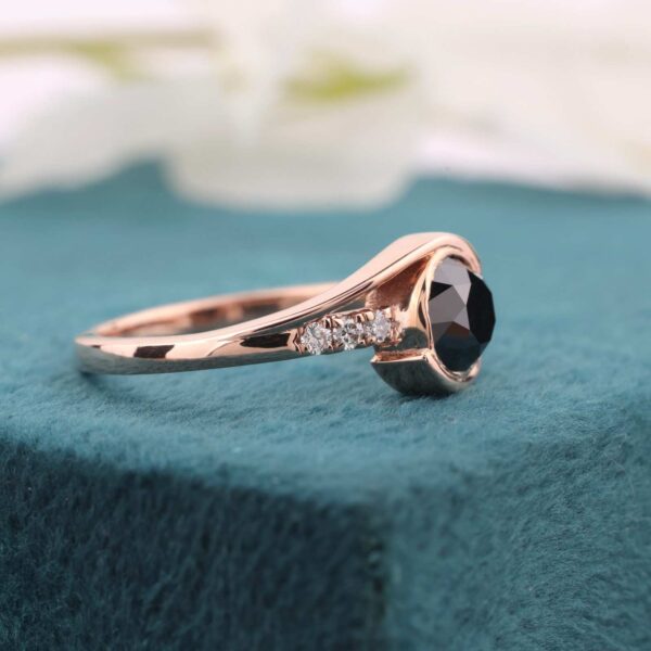 Rose Gold Twisted Ring with Round Black Stone and Diamond Accents