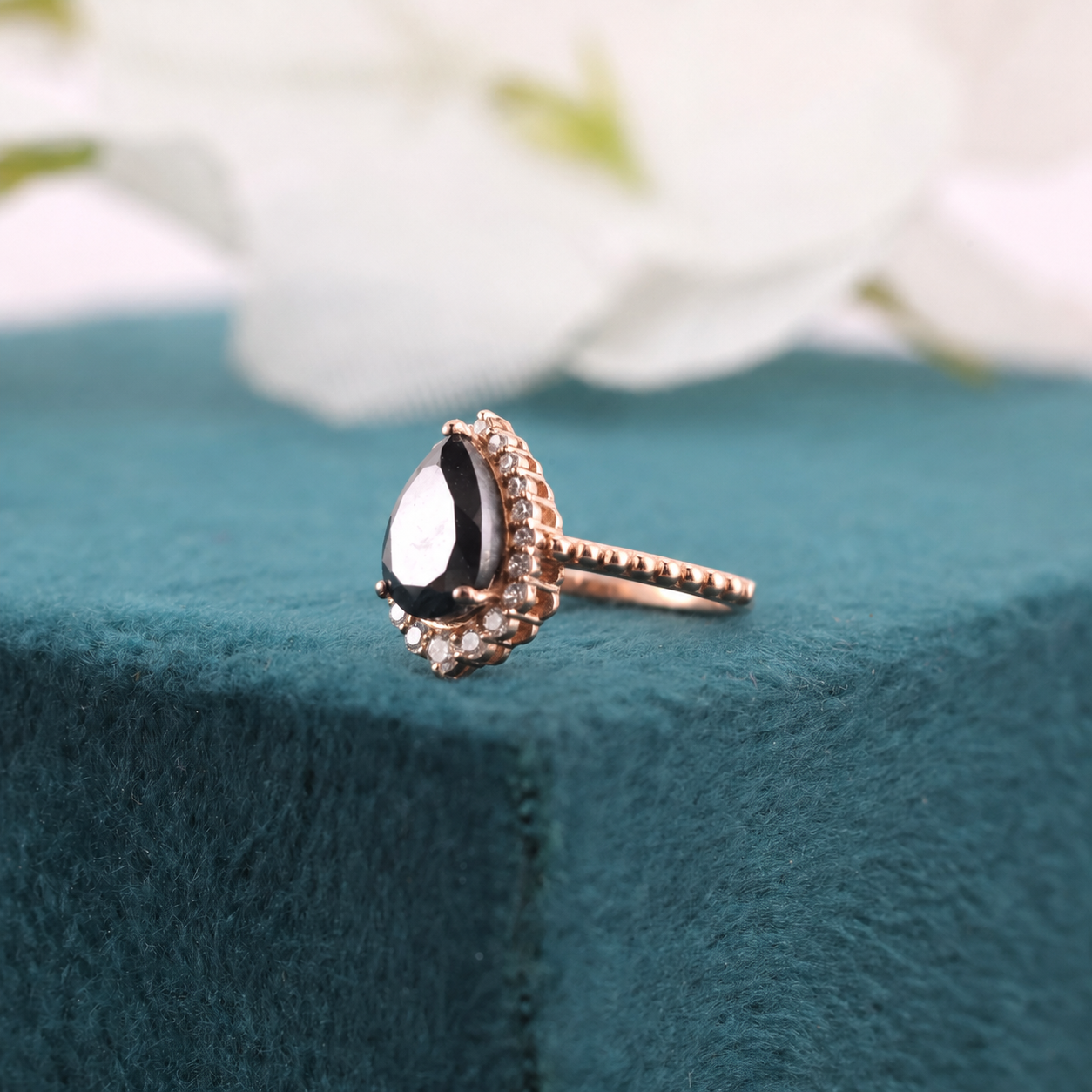 Make a Bold Promise with Our Pear & Round Natural Diamond Ring