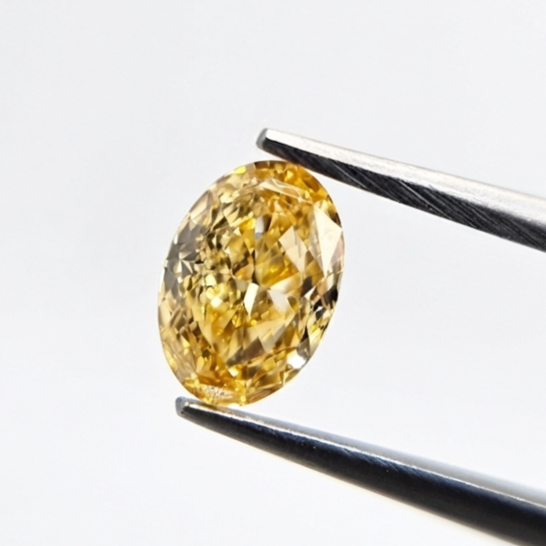 0.44 CT GIA Certified Fancy Intense Orange-Yellow Oval Cut Natural Loose Diamond